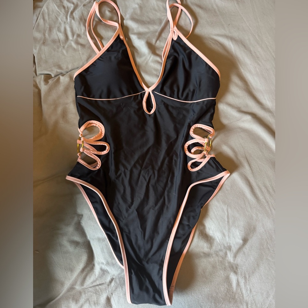 Black and pink one piece floral cut out bathing suit